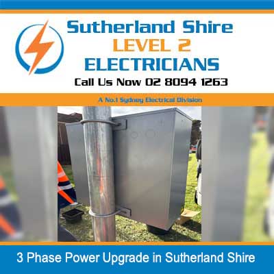 Three-phase electrical meter enclosure with worker in Sutherland Shire