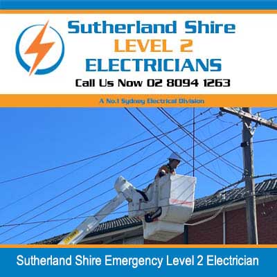 Utility truck with extended boom lift with emergency level 2 electricians positioned near power lines in Sutherland Shire