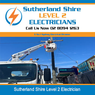 Utility truck with extended boom lift level 2 electrician near power lines in Sutherland Shire